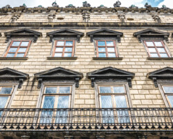 Facade of an old architectural building, classical architecture.